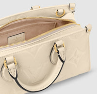 OnTheGo East West Monogram Reverse Canvas Daily Stuff